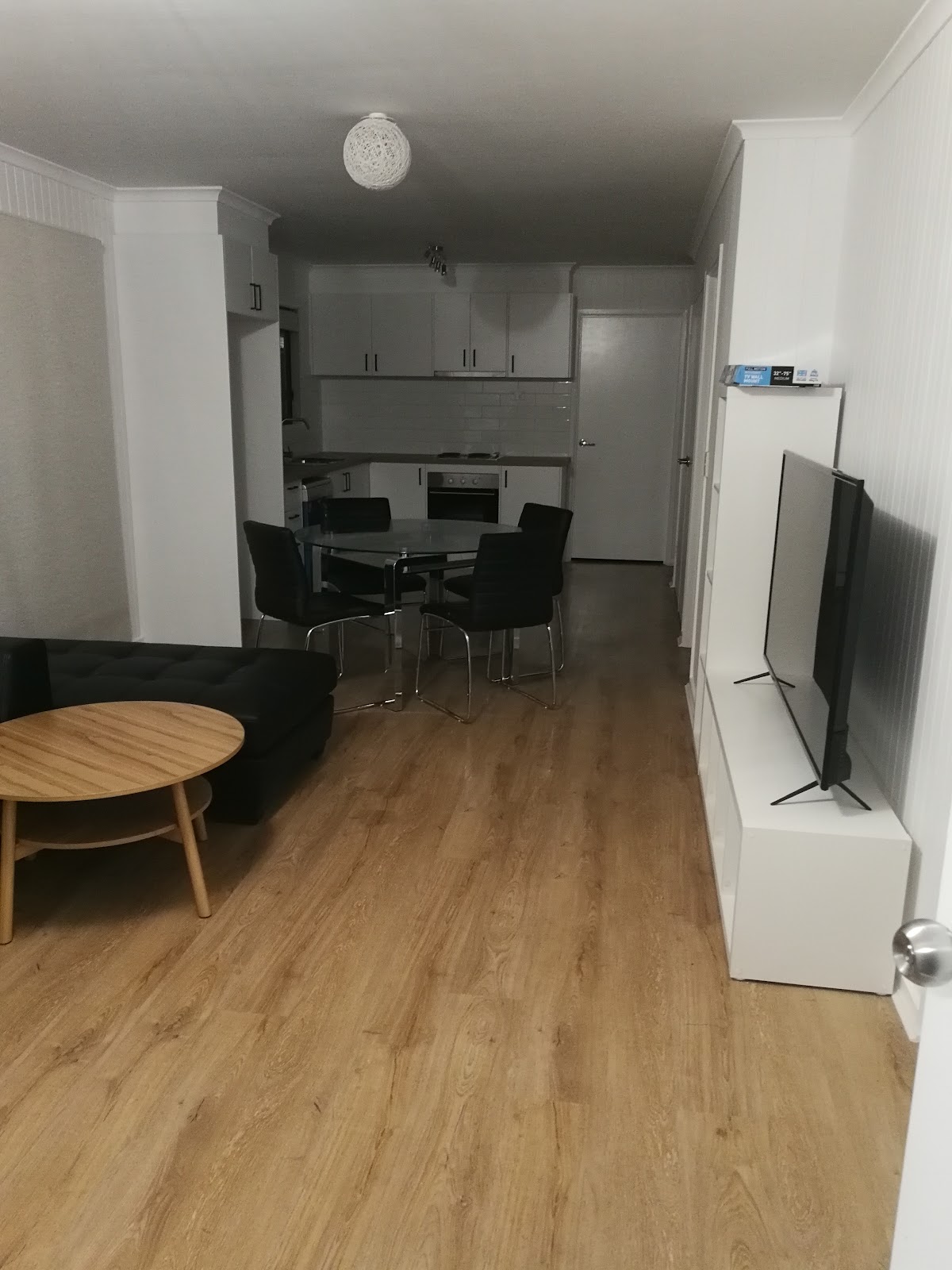 The finished living and dining room with the new floor down